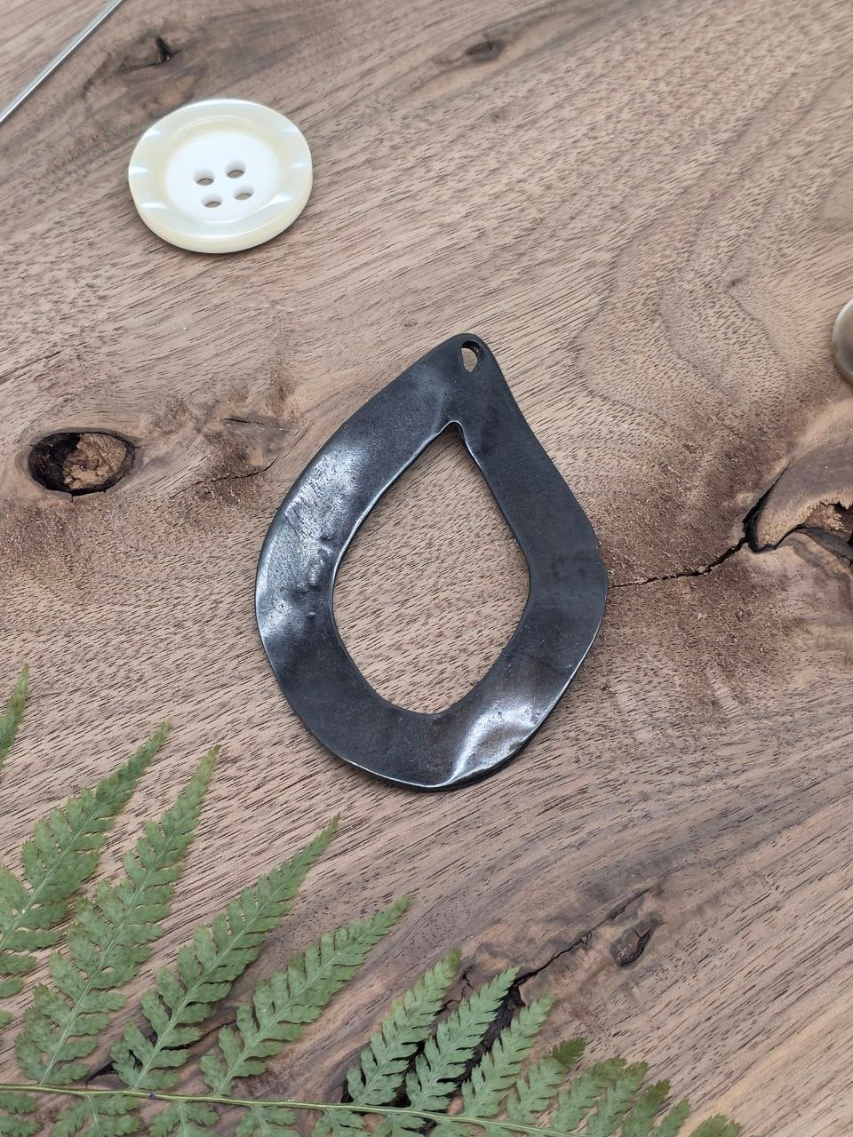 Organic Teardrop Metal Pendant – Black Gunmetal, 90 × 60 mm Description